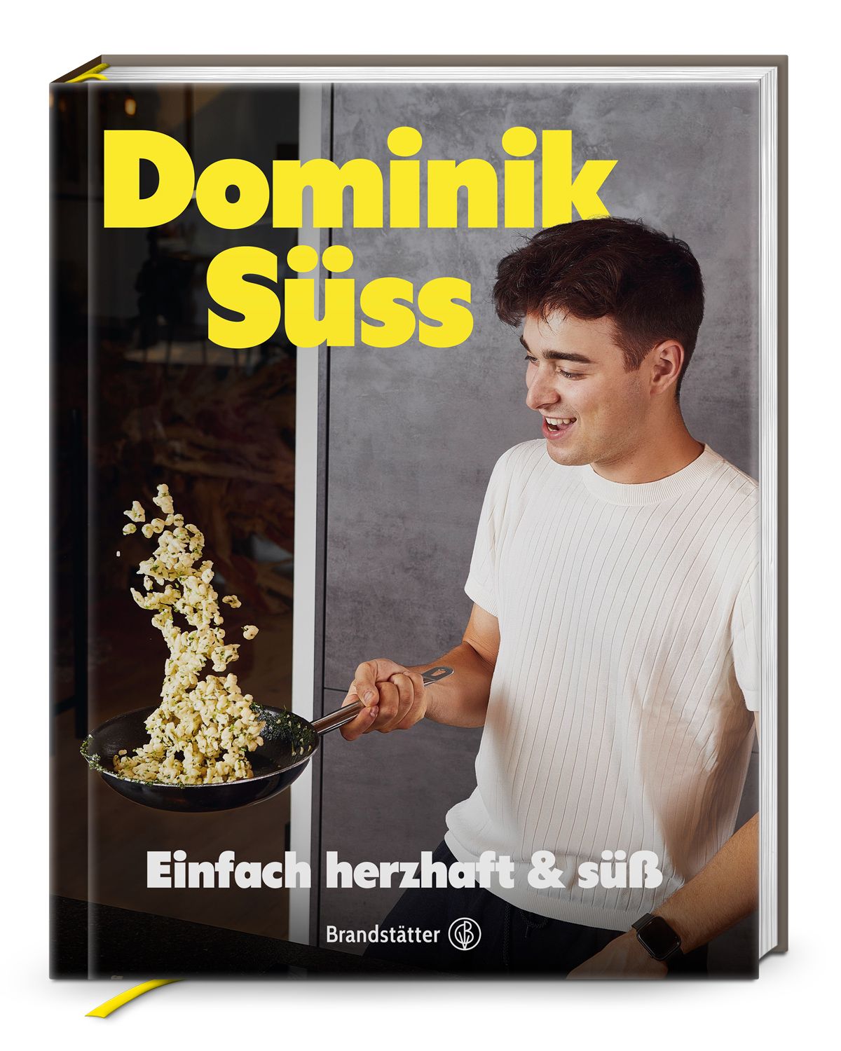 EIn junger Mann kocht in einer Küche - mit einer Pfanne. Daunter der Titel: Einfach herzhaft & süß. Darüber der Autor: Dominik Süss. 